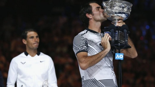 _93858796_rogerfedererkissesthetrophy_reuters