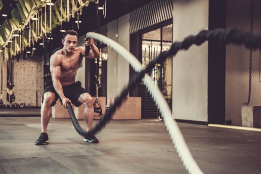 muscular-man-is-doing-battle-rope-exercise