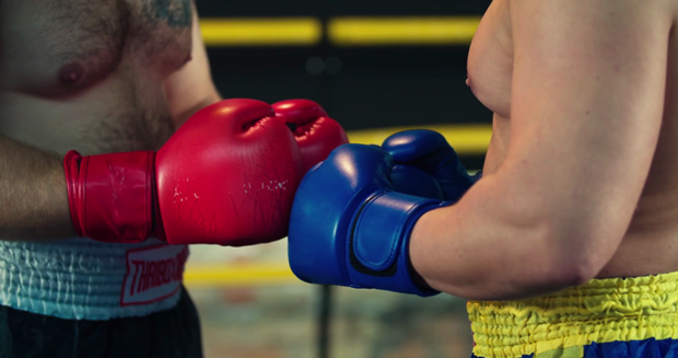 two-boxers-start-a-fight-touch-gloves-each-other-before-combat-4k-video-in-boxing-ring-handshake-respect-tradition-before-sparring-close-up-view_s8w9_y_qe_thumbnail-full01-1024x540