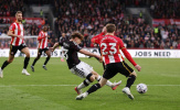 Liverpool ngược dòng hạ Brentford trong trận cầu hai thẻ đỏ