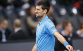 Chùm ảnh: Djokovic nhăn nhó rời Paris Masters
