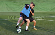 Deulofeu so tài với Dennis Suarez trên sân tập