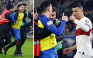 Ronaldo phản ứng đẳng cấp khi fan cuồng chạy vào sân