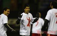 Luis Suarez buộc phải giảng hòa với Patrice Evra