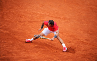 Chung kết Roland Garros hoãn vì bóng ướt