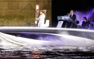 Video Olympic: David Beckham dùng cano chở người đẹp cầm đuốc Olympic
