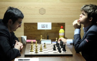 Carlsen hòa Kramnik để tách tốp