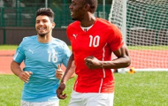 Video: 'Tia chớp đen' Usain Bolt hướng dẫn Aguero 'chạy đà' trước thềm derby thành Manchester