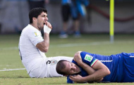 Suarez bị phạt nặng, Uruguay dọa tẩy chay World Cup