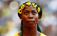 VĐV cài hoa lên đầu vô địch 100 m nữ giải vô địch thế giới