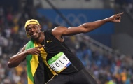 Usain Bolt khoe giày vàng, hào hứng tự sướng với đồng nghiệp nữ