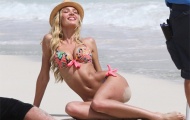 Thân hình vệ nữ 'nóng từng khúc' của Candice Swanepoel
