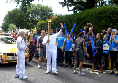 Hình ảnh của Lê Quang Liêm tại lễ rước đuốc