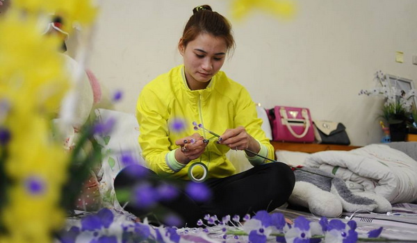 VĐV Việt vừa tập luyện, vừa chuẩn bị quà tết