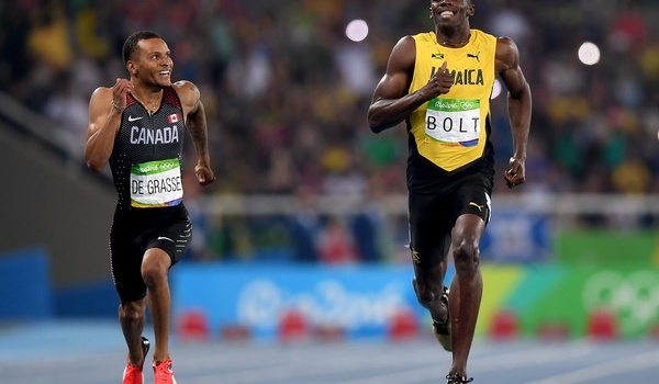 Nụ cười Usain Bolt và chân giá trị tượng đài